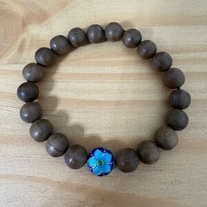 Wooden Bead Bracelet with Blue Flower Accent
